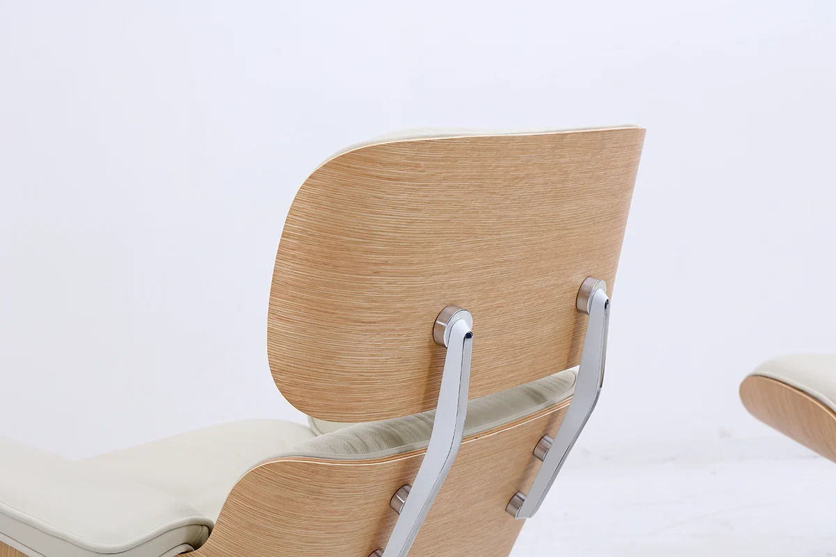 cream leather eames lounge chair with oak wood veneer